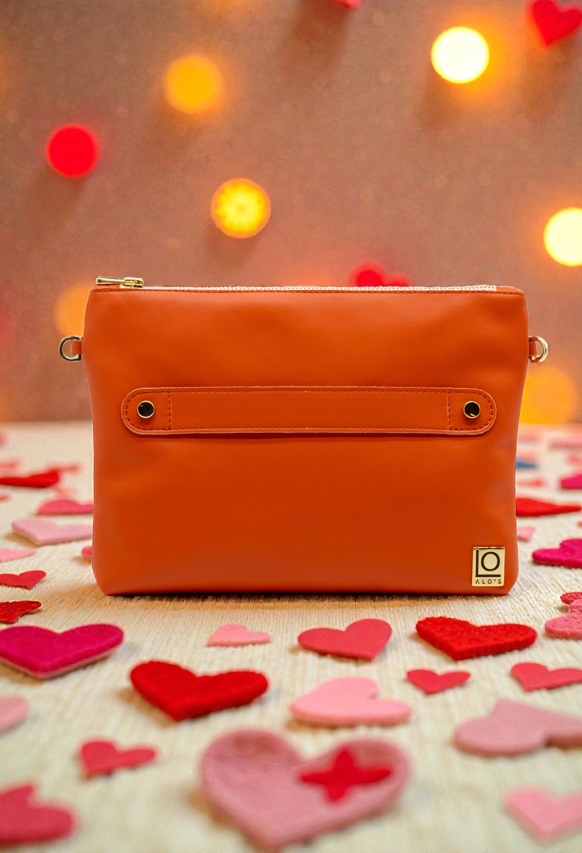 pochette arancione artigianale in pelle color zucca made in italy