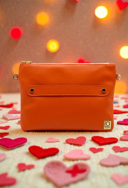 pochette arancione artigianale in pelle color zucca made in italy
