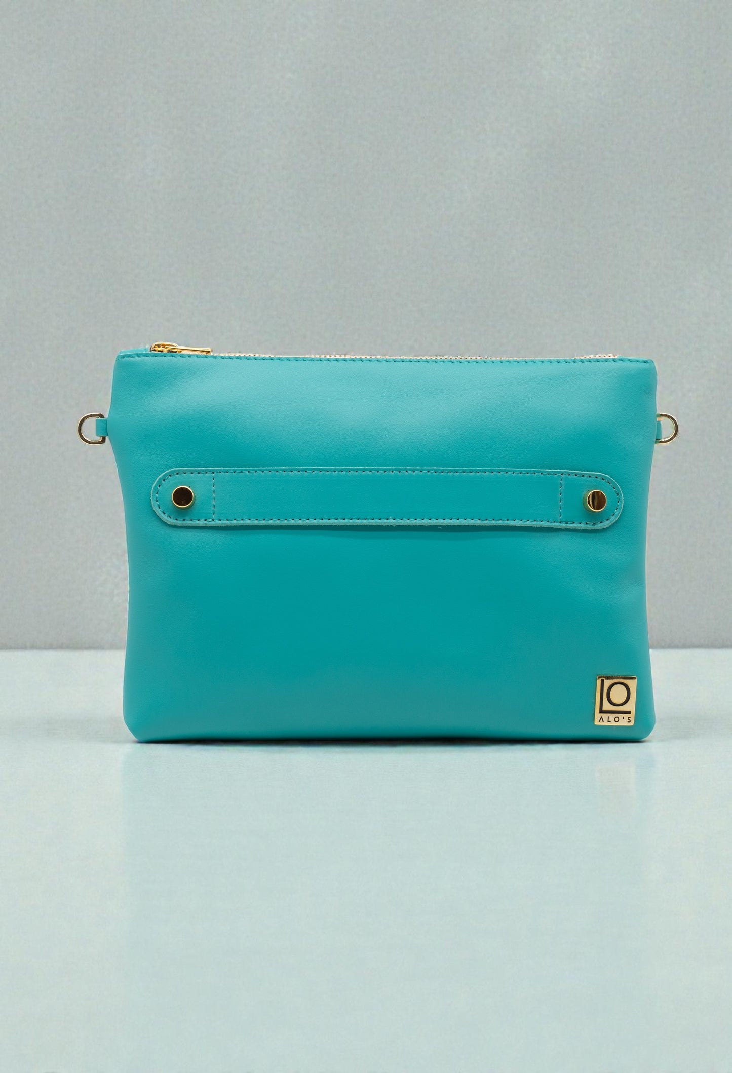 pochette azzurra artigianale in pelle turchese borsa a mano madfe in italy