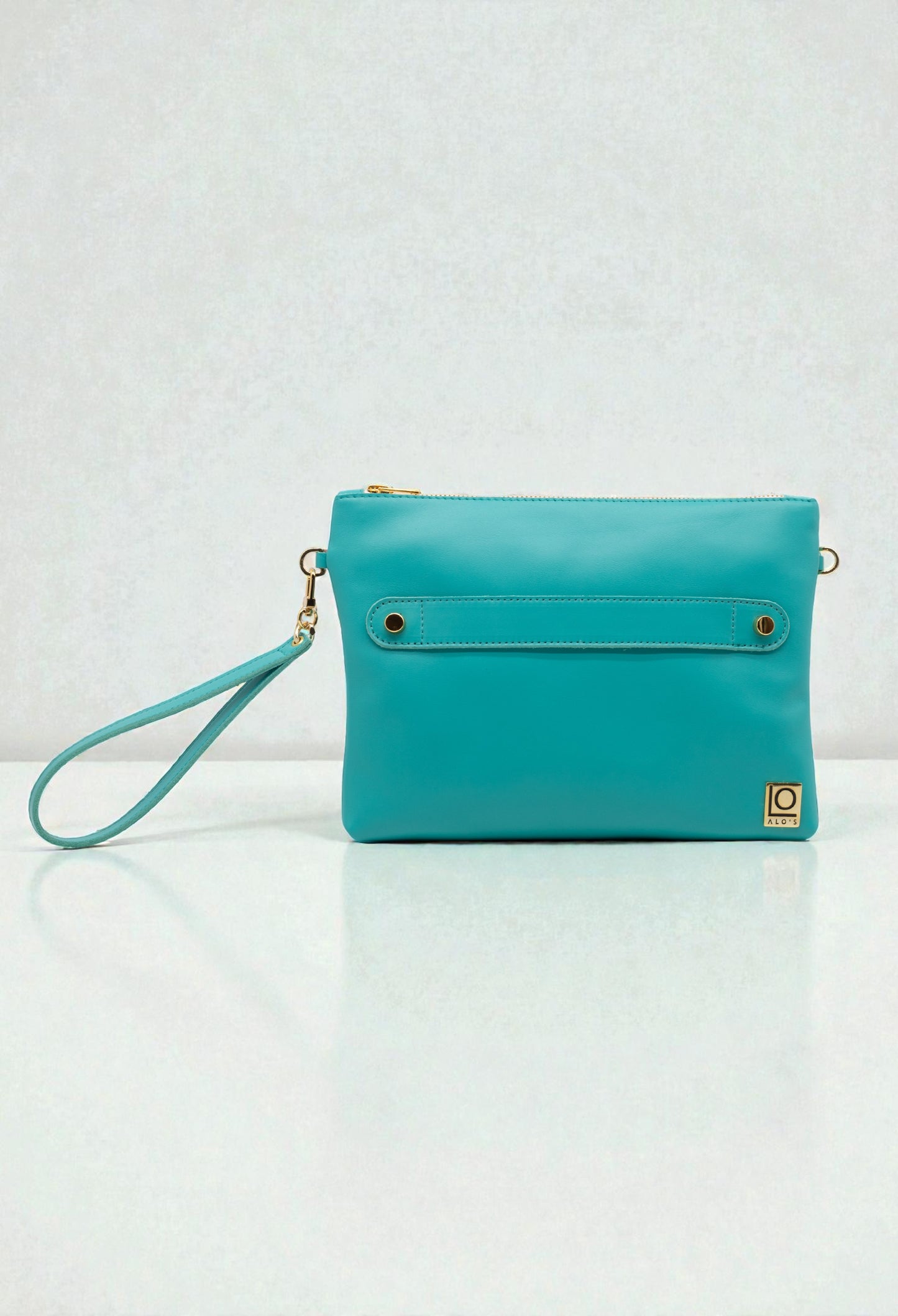 pochette zzurra artigianale in pelle turchese made in italy a mano con braccialetto