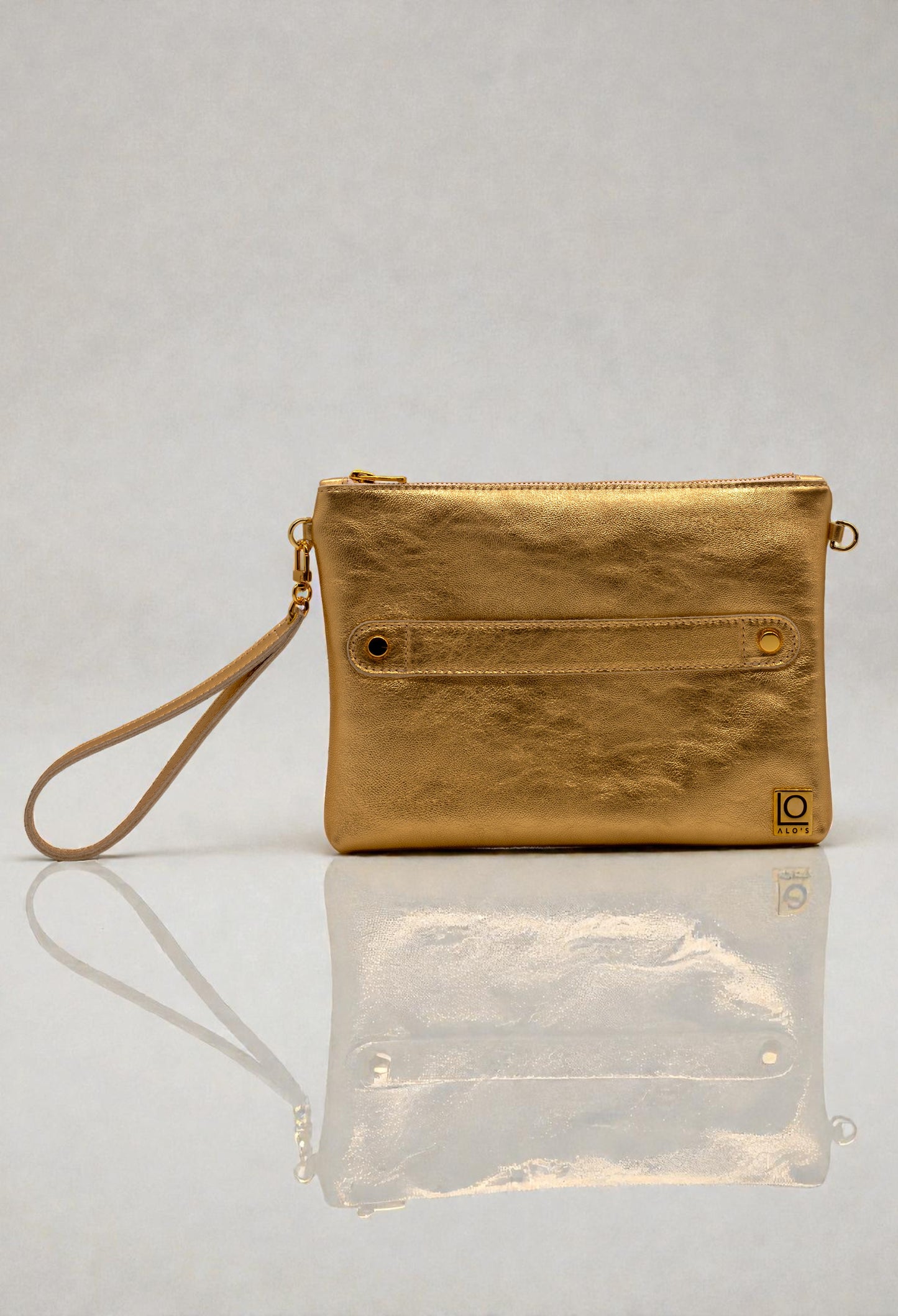 pochette oro artigianale in pelle laminata made in italy a mano con braccialetto