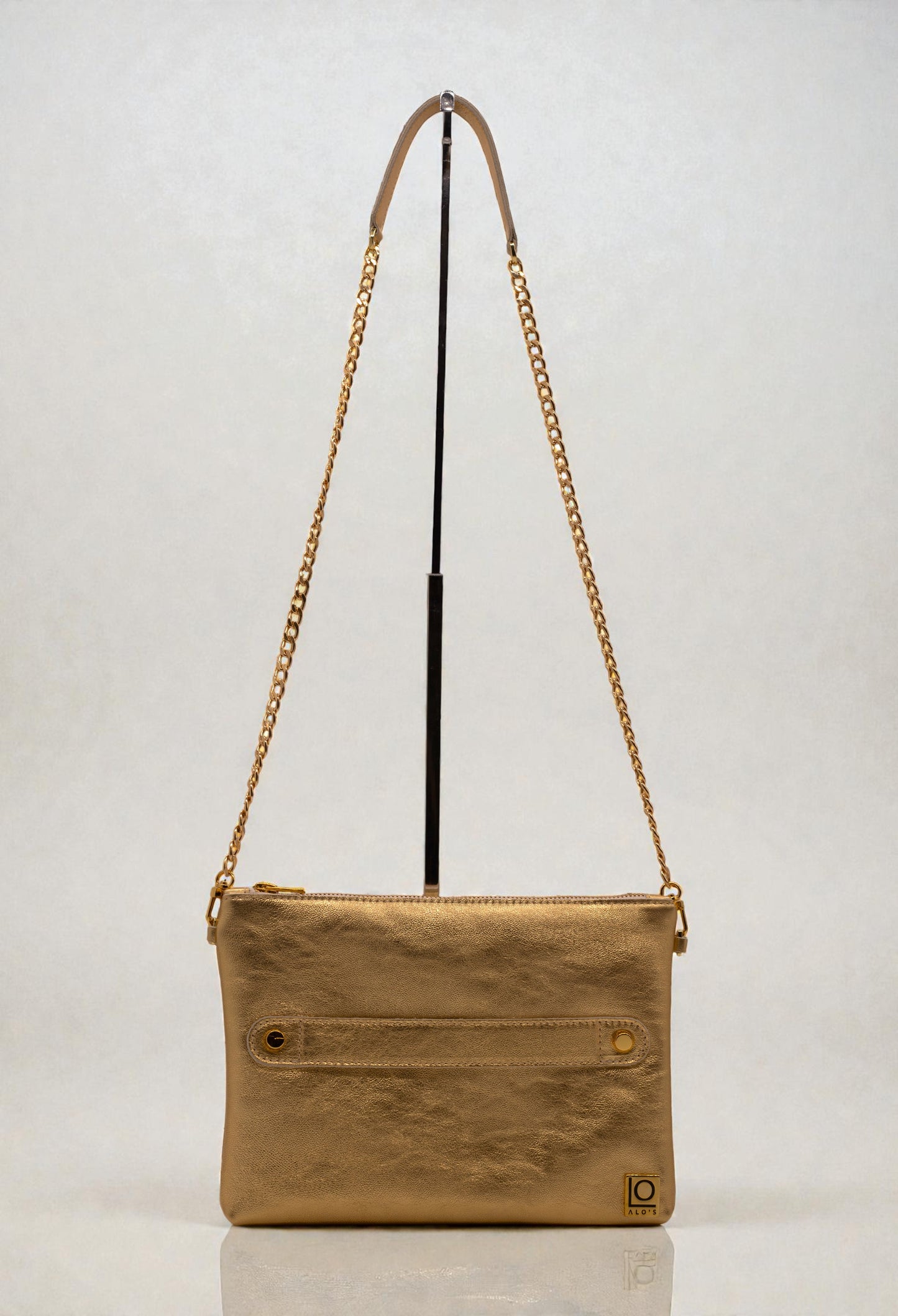 pochette oro artigianale in pelle laminata made in italy tracolla