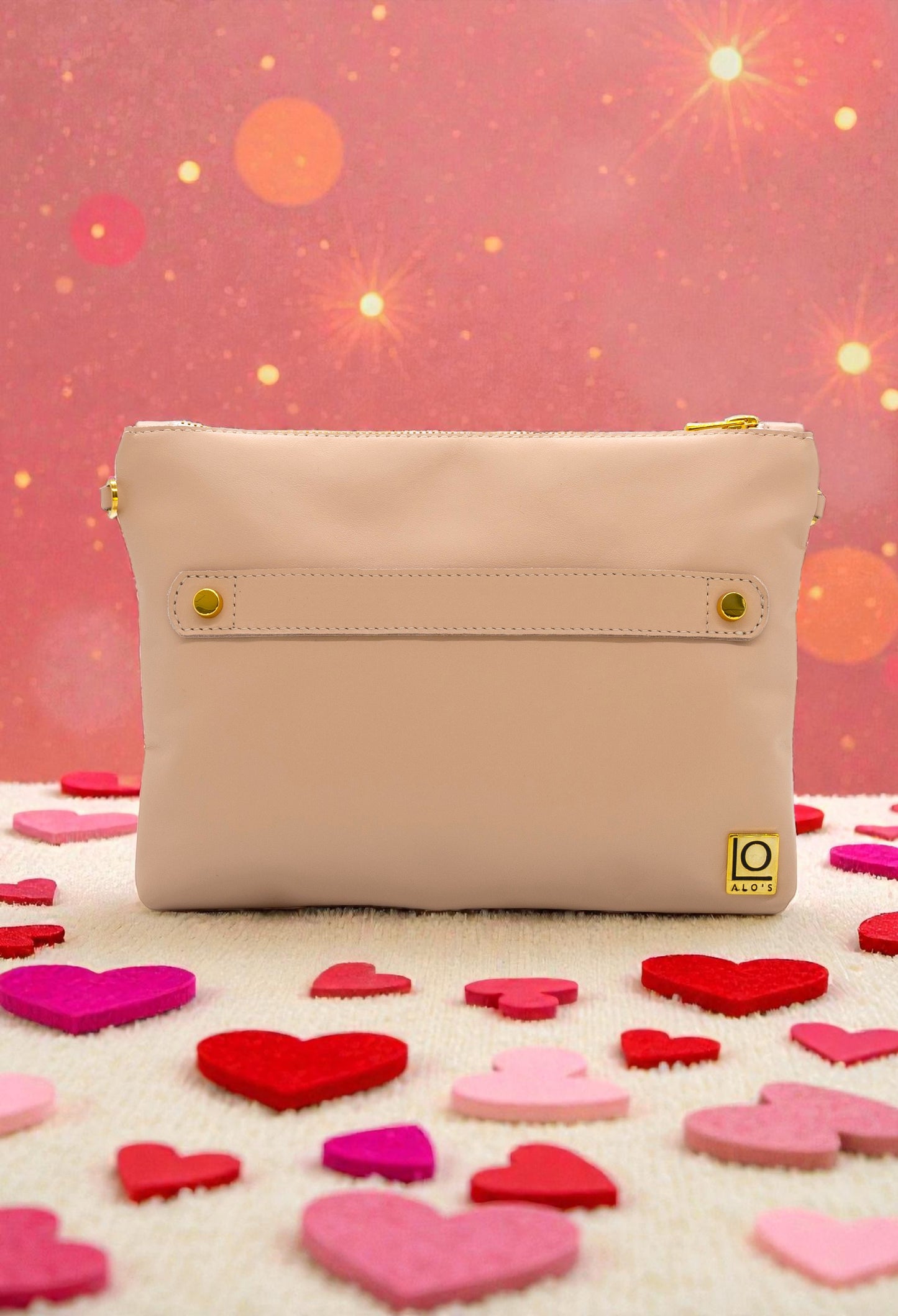 pochette rosa artigianale in pelle color cipria made in italy