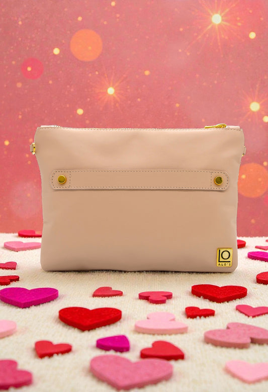 pochette rosa artigianale in pelle color cipria made in italy