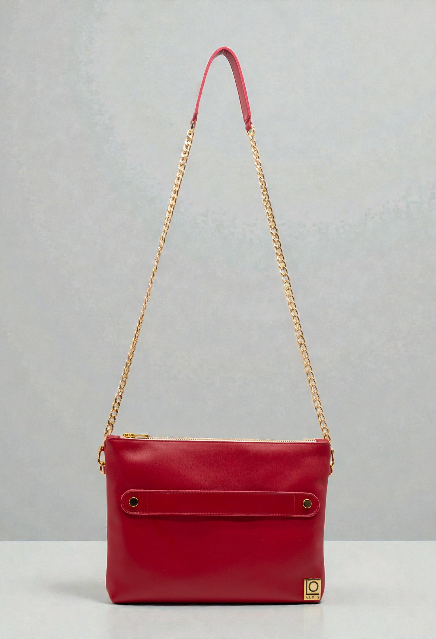 pochette rossa artigianale in pelle rosso ciliegia made in italy tracolla